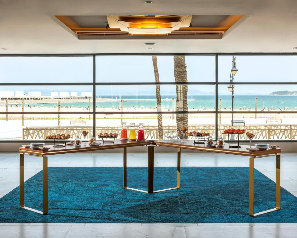 Barcelo Tanger Hotel ภายนอก รูปภาพ The lobby at the Hilton Tel Aviv