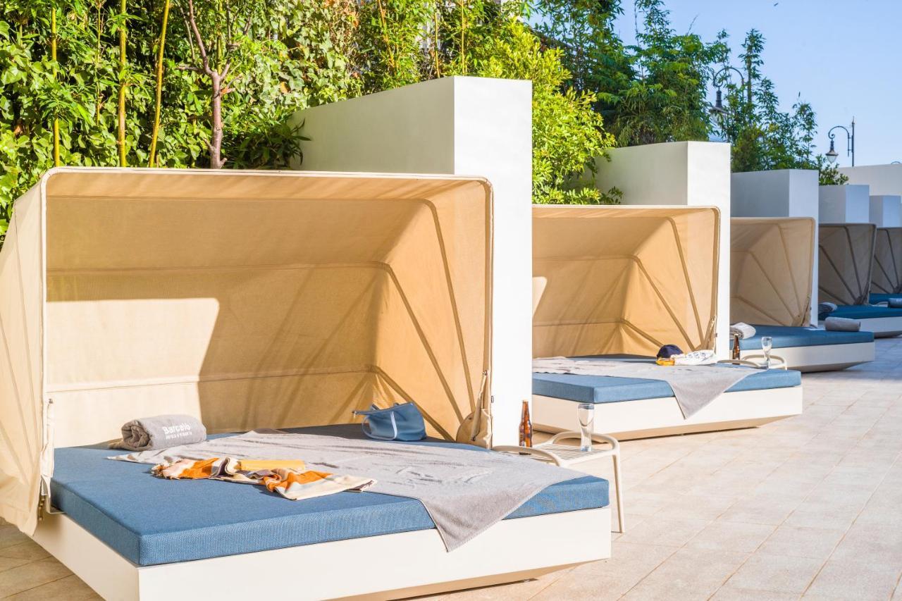 Barcelo Tanger Hotel ภายนอก รูปภาพ Cabanas at the pool