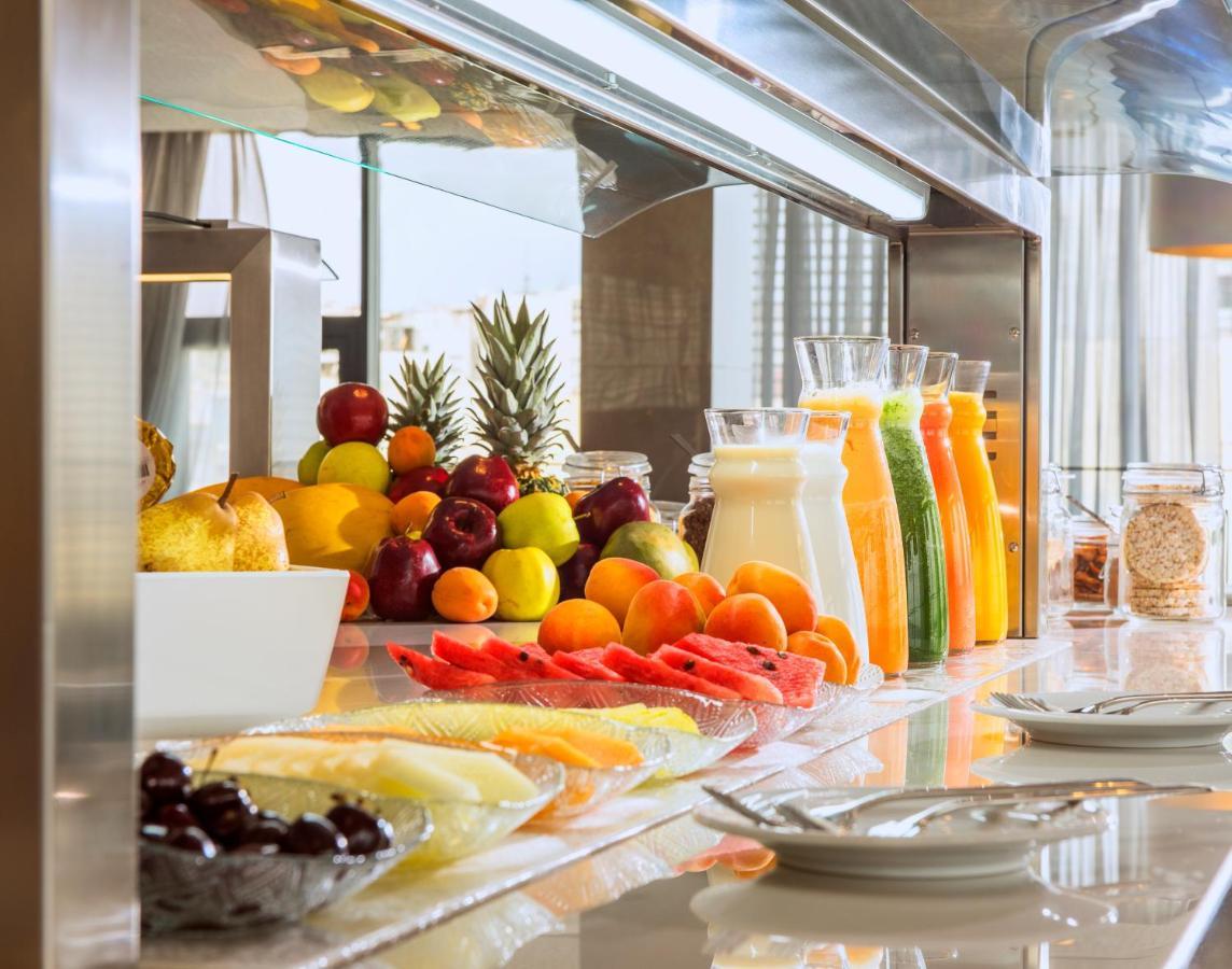 Barcelo Tanger Hotel ภายนอก รูปภาพ A buffet of fruit and juice